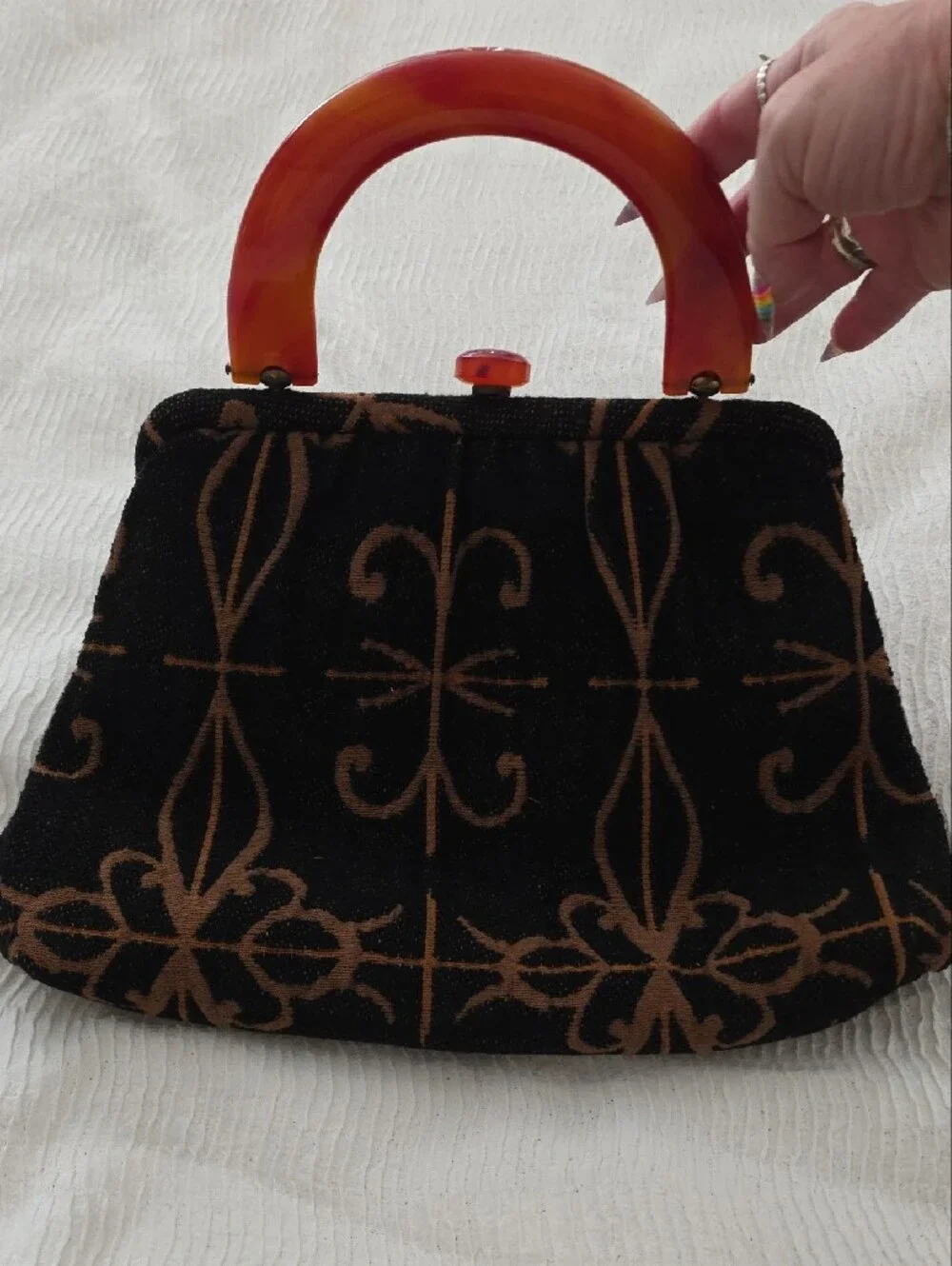 Black and Brown Patterned Wristlet Clutch with Amber Handle